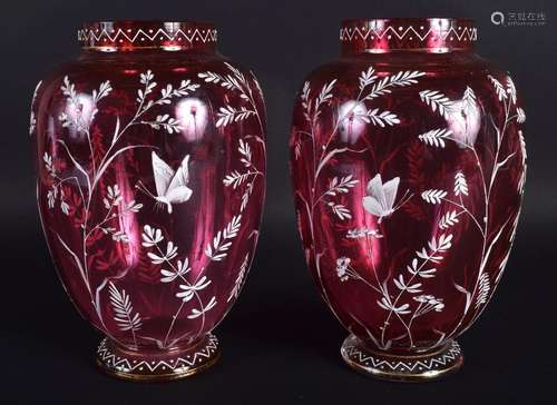 A PAIR OF ANTIQUE CRANBERRY ENAMELLED GLASS VASES