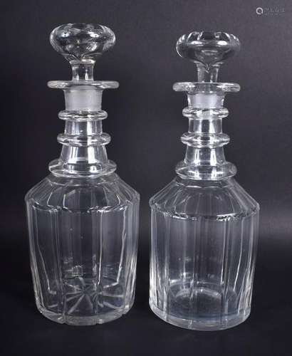 A PAIR OF GEORGE III GLASS DECANTERS AND STOPPERS. 27