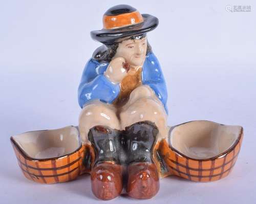 AN UNUSUAL FRENCH HENRIOT QUIMPER POTTERY FIGURE in the