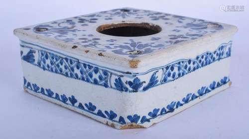 AN 18TH CENTURY DELFT FAIENCE SQUARE FORM PASTILLE