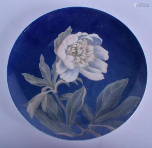 A ROYAL COPENHAGEN FLOWER PLATE. 23 cm diameter.