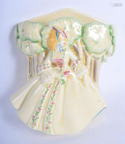 AN UNUSUAL ART DECO CRINOLINE LADY WALL POCKET