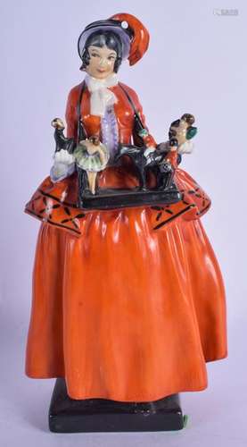 A RARE ROYAL DOULTON FIGURE OF A FEMALE PUPPETEER