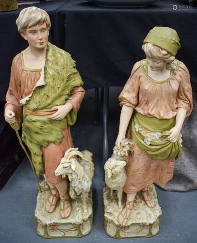 A LARGE PAIR OF ROYAL DUX PORCELAIN FIGURE OF A MALE