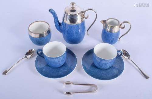 A ROYAL DOULTON TEA FOR TWO POWDER BLUE TEASET. (7)