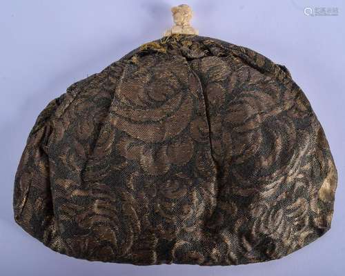 A RARE ANTIQUE CARVED JOCKEY HEAD I SILKWORK PURSE. 22