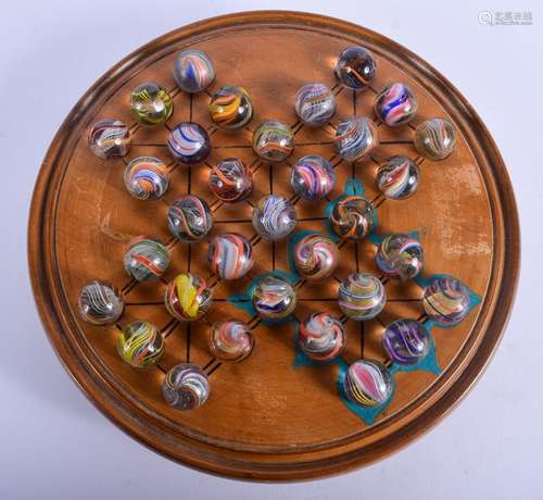 ANTIQUE SOLITAIRE GLASS MARBLES. 1.75 cm wide. (34)