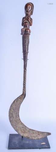 A LARGE 19TH CENTURY AFRICAN TRIBAL CARVED WOOD SCYTHE.
