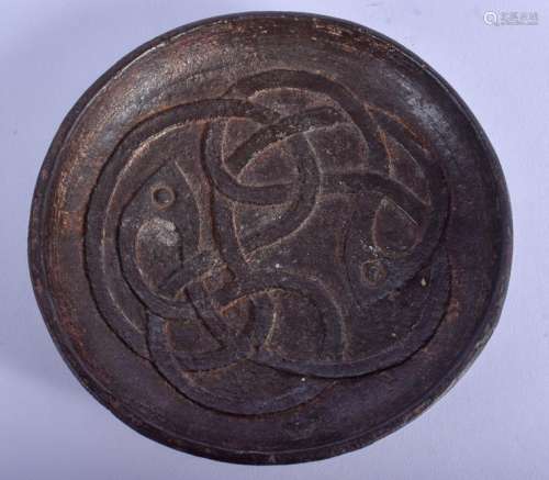 AN ARTS AND CRAFTS IRON OVERLAID WOODEN DISH. 12 cm