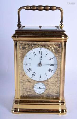 A FRENCH BRASS REPEATING CARRIAGE CLOCK engraved with