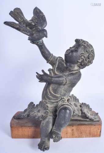 A MID 19TH CENTURY BRONZE FIGURE OF A SEATED PUTTI