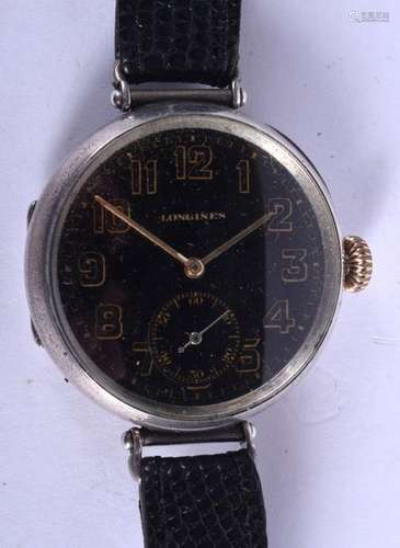 A VINTAGE 1950S LONGINES BLACK DIAL WRISTWATCH. 3.25 cm