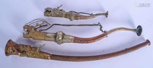 THREE EARLY 20TH CENTURY TIBETAN COPPER HORNS. Largest