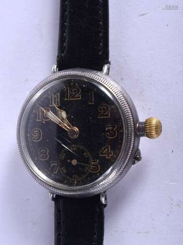 A 1940 SILVER TRENCH STYLE BLACK DIAL WRISTWATCH. 2.75