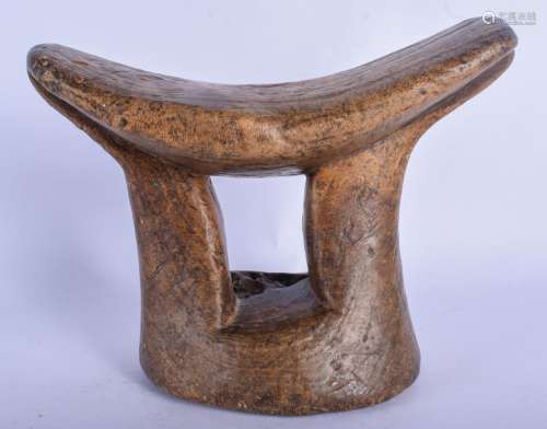 AN EARLY 20TH CENTURY AFRICAN TRIBAL SOFTWOOD NECK