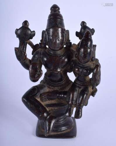 A 16TH/17TH INDIAN BRONZE FIGURE OF A BUDDHISTIC DEITY.