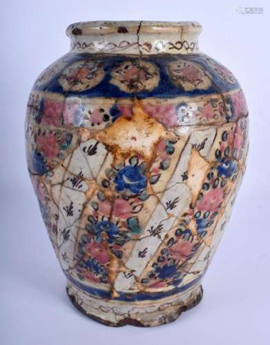 AN EARLY MIDDLE EASTERN PERSIAN ISLAMIC POTTERY VASE.