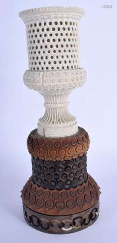 AN UNUSUAL 19TH CENTURY CONTINENTAL I AND NUT WOOD VASE