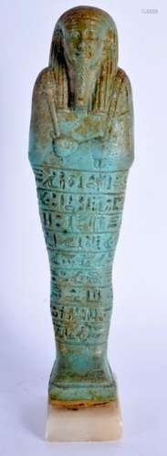 AN EGYPTIAN PALE BLUE-GREEN FAIENCE USHABTI OF