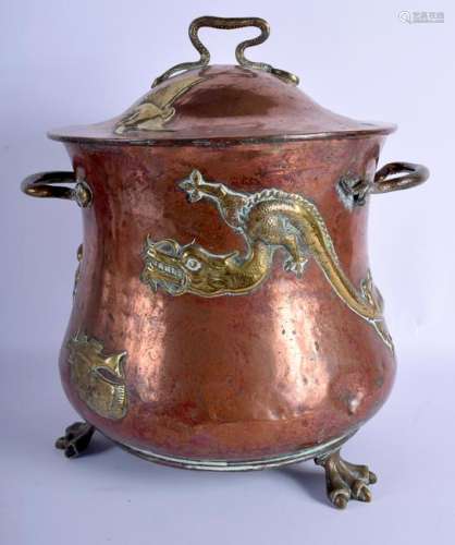 A LARGE ARTS AND CRAFTS COPPER AND BRASS COAL BUCKET