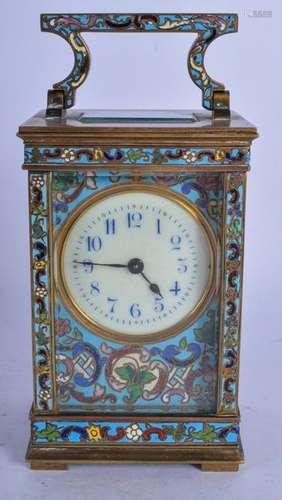 AN EARLY 20TH CENTURY FRENCH BRASS AND CHAMPLEVÉ ENAMEL