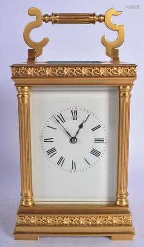 AN ANTIQUE FRENCH BRASS STRIKING CARRIAGE CLOCK. 19 cm