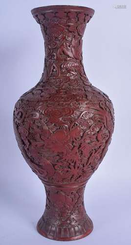 A 19TH CENTURY CHINESE CARVED CINNABAR LACQUER VASE