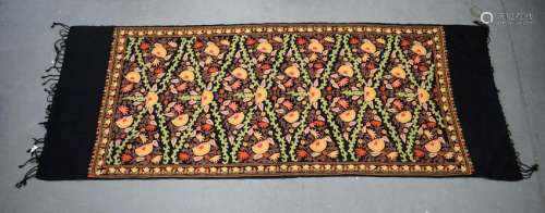 AN EARLY 20TH CENTURY EASTERN TEXTILE.
