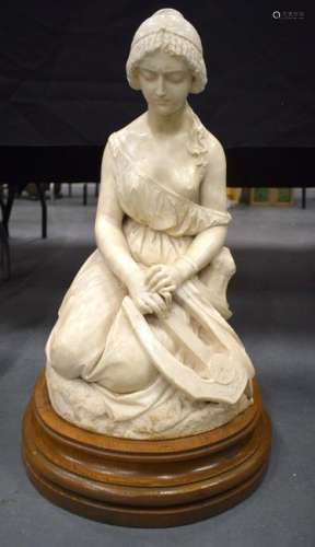 A 19TH CENTURY EUROPEAN CARVED MARBLE FIGURE OF A