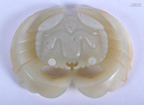 A 19TH CENTURY CHINESE GREENISH WHITE JADE CARVING OF A