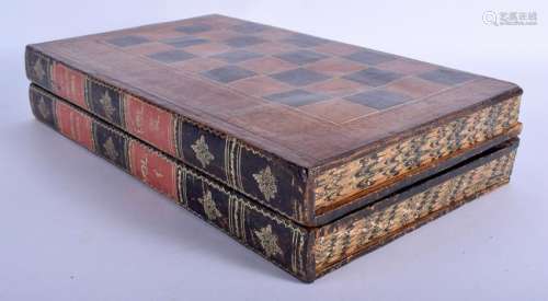 A VINTAGE LEATHER FAUX BOOK FOLDING CHESS GAMING BORD.
