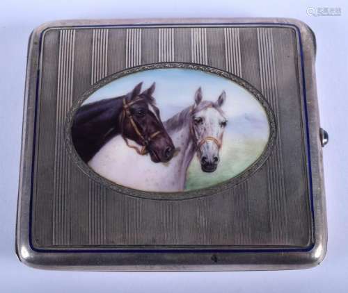 AN ART DECO WHITE METAL AND ENAMEL CIGARETTE CASE