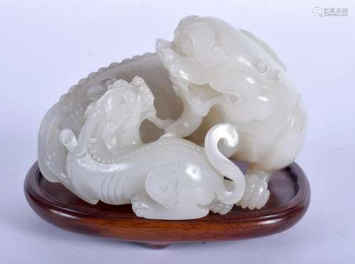 A LARGE 19TH CENTURY CHINESE CARVED WHITE JADE FIGURE