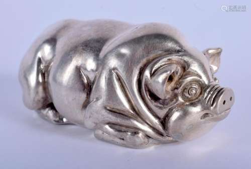 A CONTINENTAL SILVER FIGURE OF A RECUMBENT PIG. 64