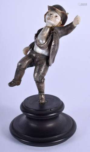 AN UNUSUAL ART DECO SILVER AND PEARL FIGURE OF A JOVIAL