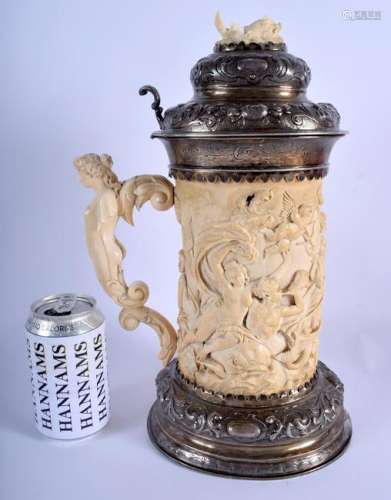 A LARGE 18TH/19TH CENTURY CONTINENTAL CARVED I TANKARD