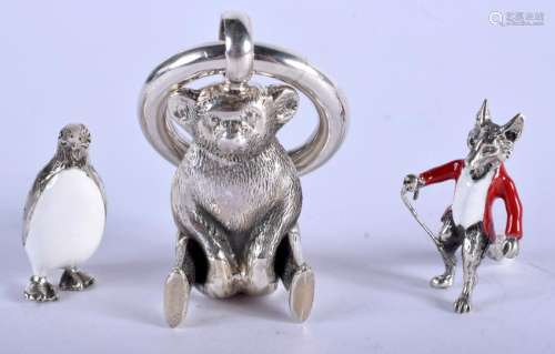 A NOVELTY SILVER BEAR BABIES RATTLE together with two
