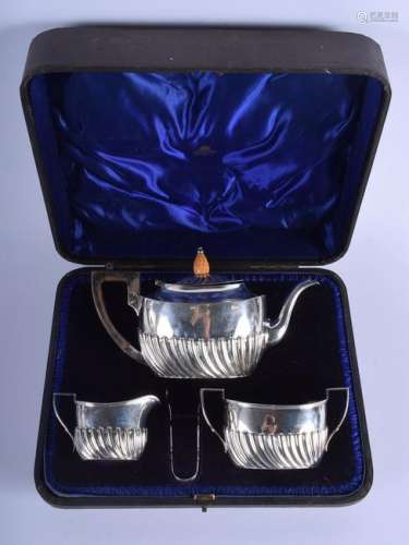 A CASED ENGLISH SILVER TEASET with tongs, various dates