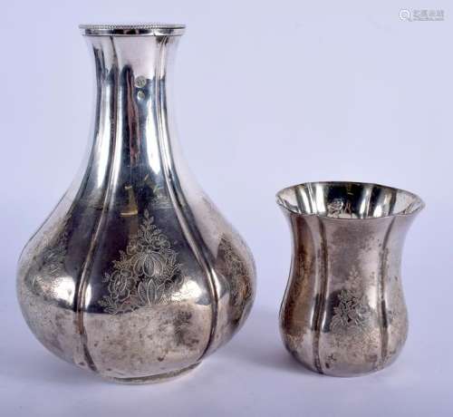 AN ANTIQUE MIDDLE EASTER PERSIAN SILVER BOTTLE with
