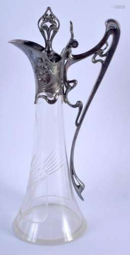 A LARGE ART NOUVEAU SILVER PLATED WMF GLASS CLARET JUG.