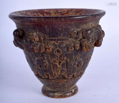A 19TH CENTURY CHINESE CARVED HORN LIBATION CUP