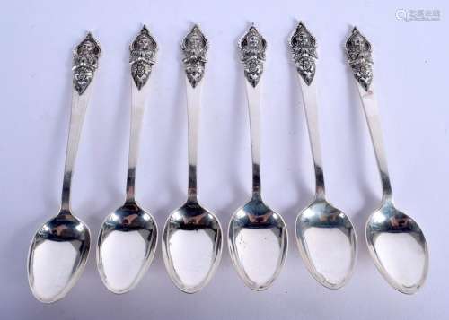 A SET OF SIX SIAM ASIAN SILVER SPOONS with Buddhistic