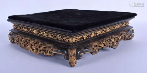 A 19TH CENTURY CHINESE BLACK AND GILT LACQUER STAND