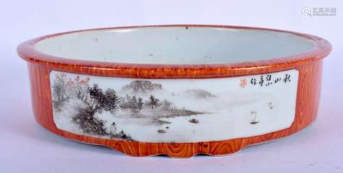 AN EARLY 20TH CENTURY CHINESE IMITATION AGATE CIRCULAR