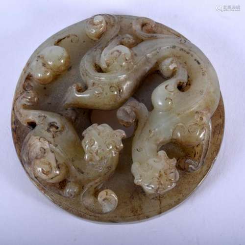 A CHINESE QING DYNASTY MUTTON GREEN JADE ROUNDEL