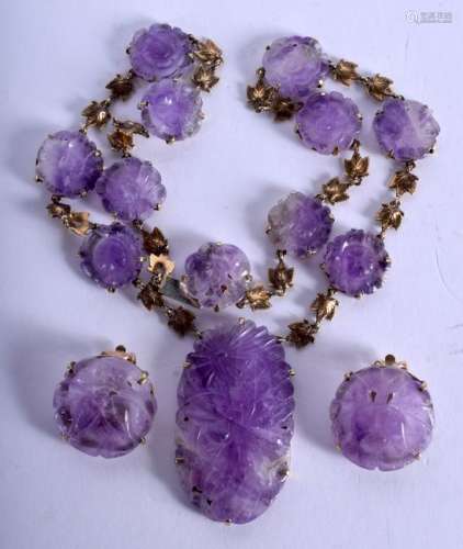 AN EARLY 20TH CENTURY 14CT GOLD CHINESE AMETHYST