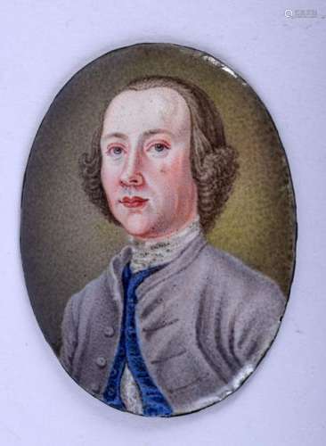 A GEORGE III PAINTED ENAMEL PORTRAIT MINIATURE. 3.5 cm