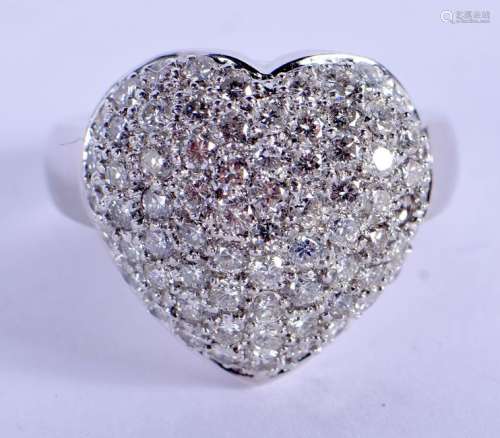 AN 18CT GOLD AND DIAMOND HEART RING PENDANT. 11.7