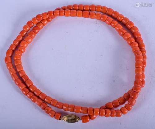 AN 18CT GOLD CHINESE CORAL NECKLACE. 73 grams. 74 cm