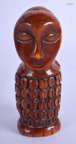 A LATE 19TH CENTURY AFRICAN TRIBAL CARVED AND STAINED I